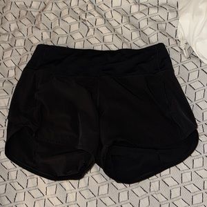 black lululemon speed up 4” shorts